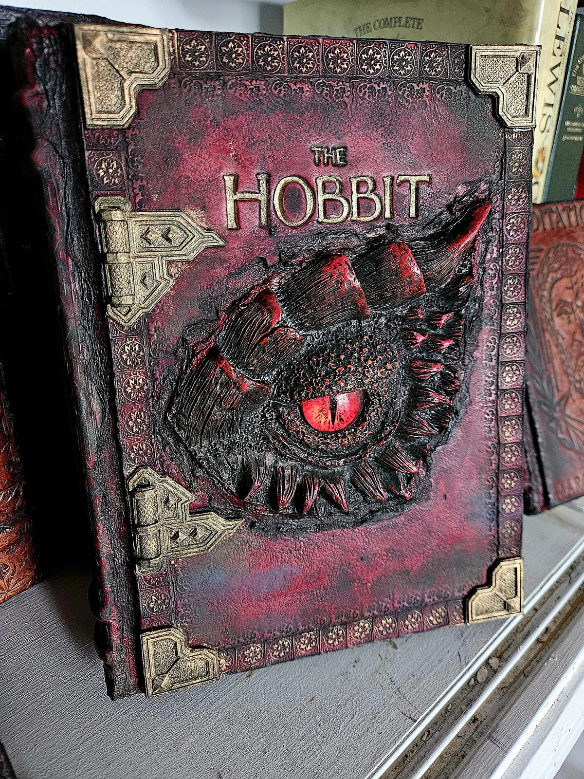 Red Hobbit front angle — supplied binding photograph