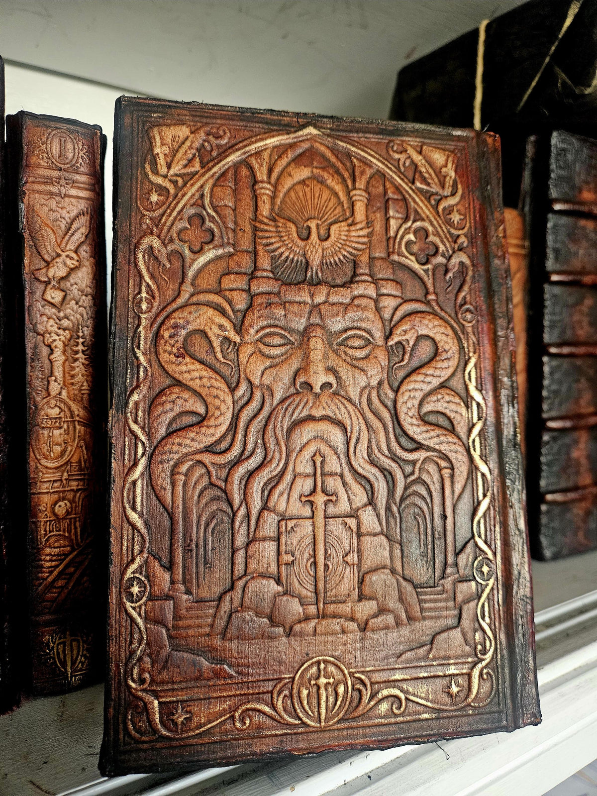 Bearded figure rear — original supplied photograph, binding example