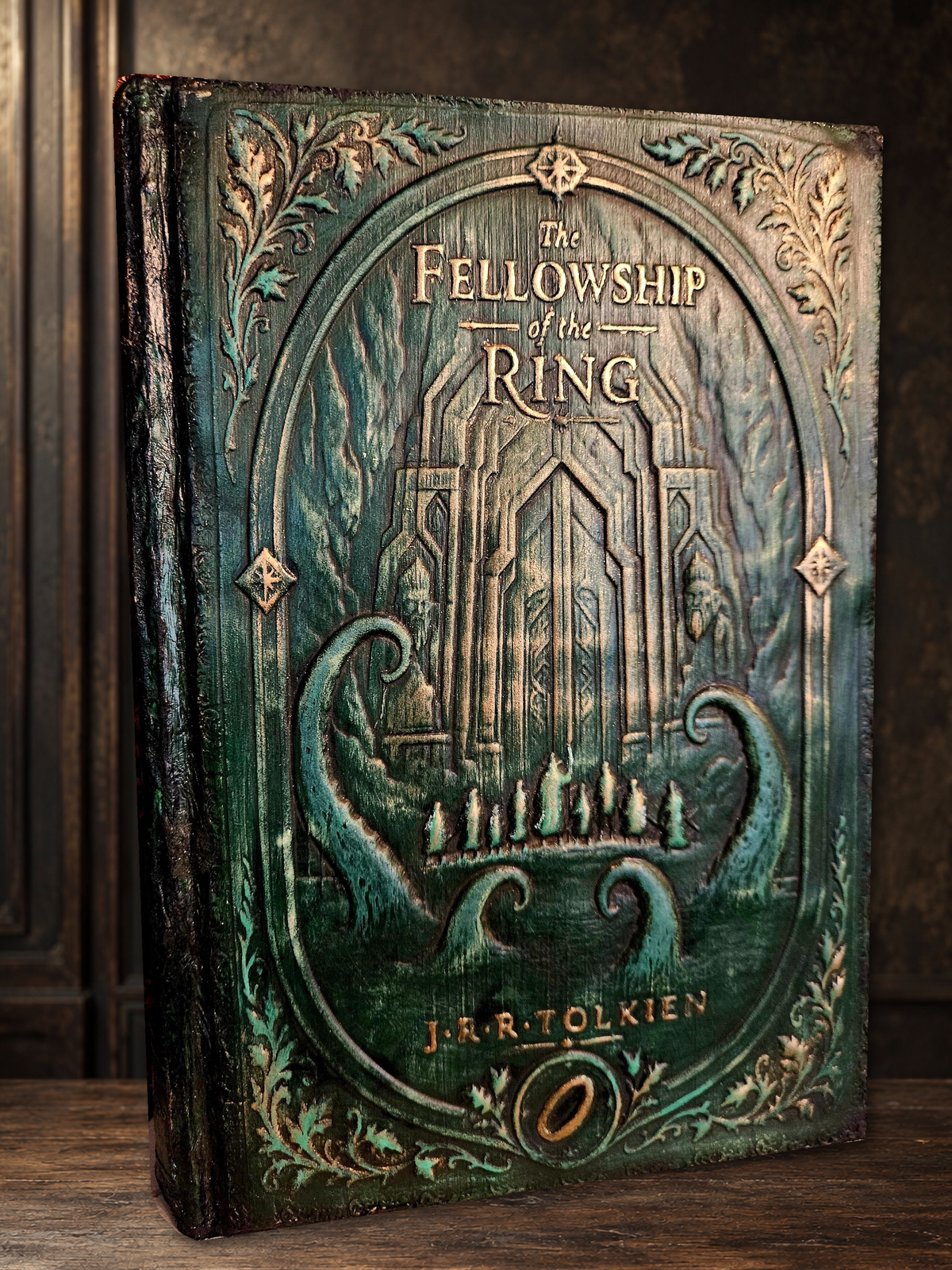 Original Tolkien leather binding photograph with matching walnut setting; original artwork preserved