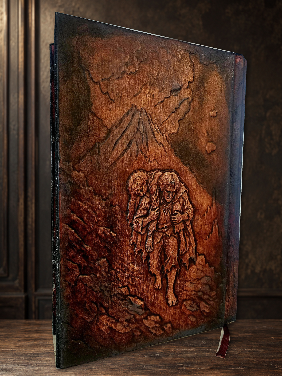 Original Tolkien leather binding photograph with matching walnut setting; original artwork preserved
